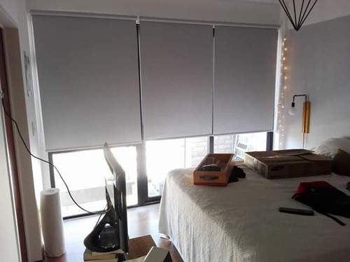 Cortinas Roller black out con cara posterior en color blanco